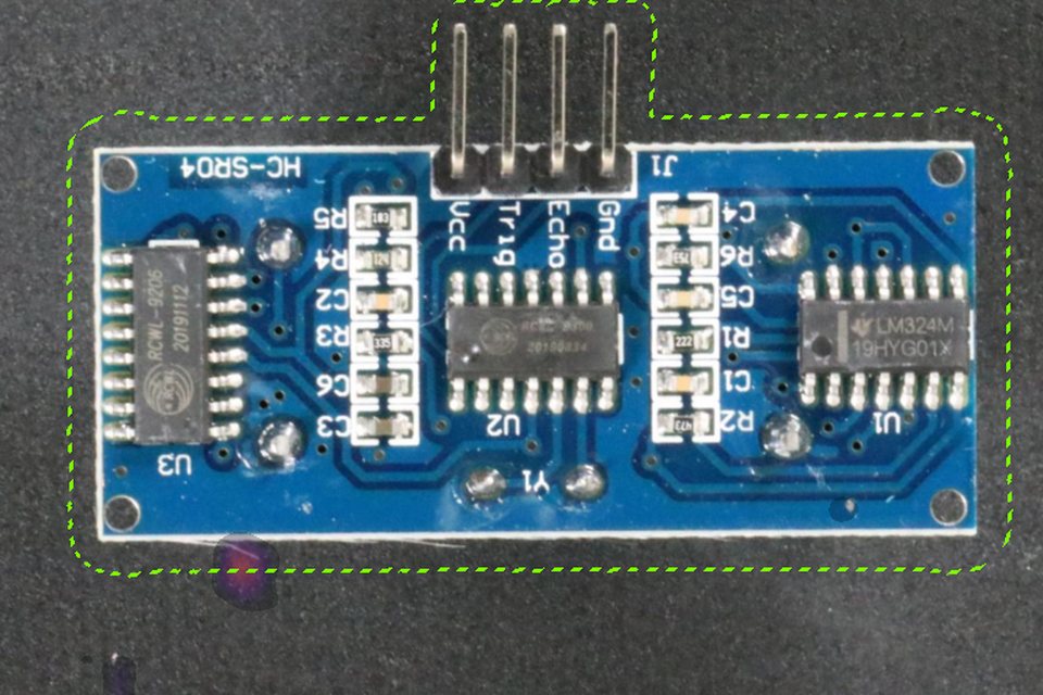 A normal PCB2 image falsely flagged by the ROI-scoring model, with an anomaly highlight near the board edge